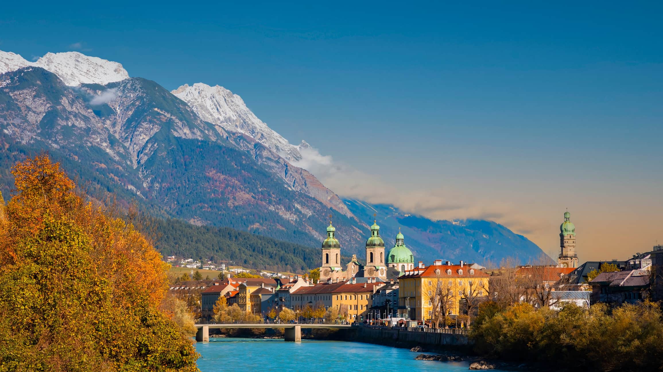 The sunset view scene with Innsbruck cityscape, colorful historic buildings in Innsbruck, Austria